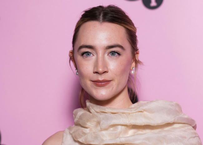 saoirse-ronan-poses-for-photographers-upon-arrival-at-the-photo-call-for-an-in-conversation-event-at-the-bfi-southbank-on-wednesday-dec-18-2024-in-london-photo-by-scott-a-garfittinvisionap