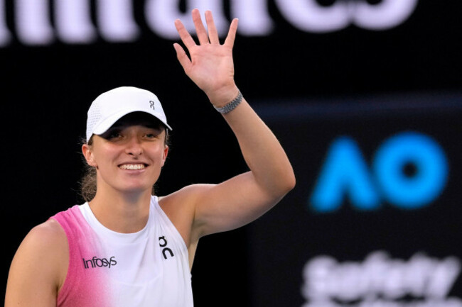 iga-swiatek-of-poland-waves-after-defeating-eva-lys-of-germany-in-their-fourth-round-match-at-the-australian-open-tennis-championship-in-melbourne-australia-monday-jan-20-2025-ap-photoasanka-b