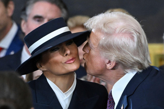 president-elect-donald-trump-kisses-melania-trump-before-the-60th-presidential-inauguration-in-the-rotunda-of-the-u-s-capitol-in-washington-monday-jan-20-2025-saul-loebpool-photo-via-ap