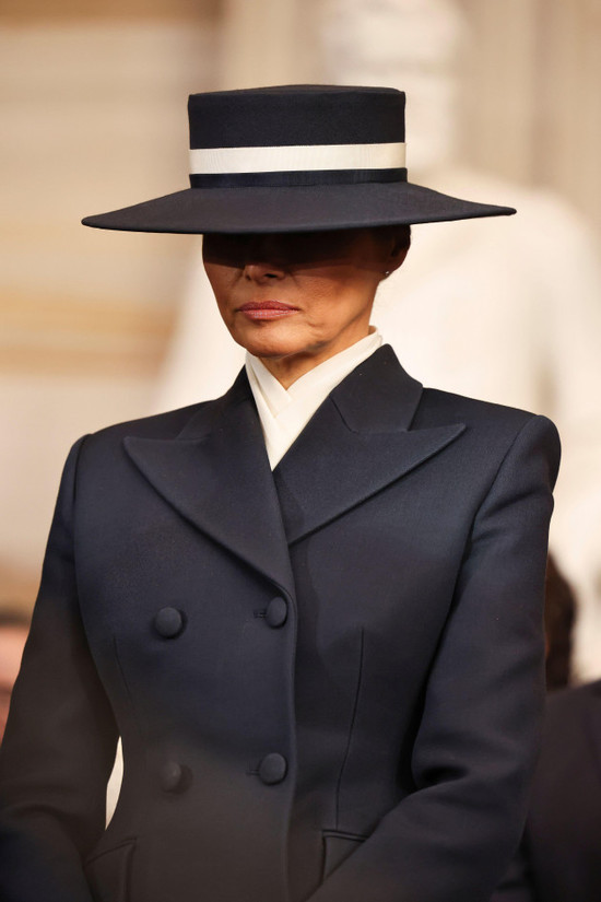 first-lady-melania-trump-bows-her-head-during-the-60th-presidential-inauguration-in-the-rotunda-of-the-u-s-capitol-in-washington-monday-jan-20-2025-chip-somodevillapool-photo-via-ap