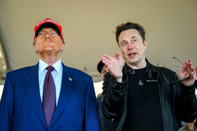 file-president-elect-donald-trump-listens-to-elon-musk-as-he-arrives-to-watch-spacexs-mega-rocket-starship-lift-off-for-a-test-flight-from-starbase-in-boca-chica-texas-nov-19-2024-brandon-bel