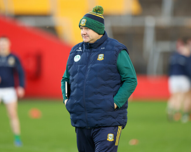 robbie-brennan-watches-his-team-before-the-game