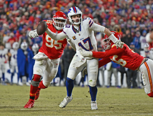 buffalo-bills-quarterback-josh-allen-17-attempts-to-throw-a-pass-against-pressure-from-kansas-city-chiefs-defensive-end-george-karlaftis-56-and-kansas-city-chiefs-defensive-tackle-chris-jones-95