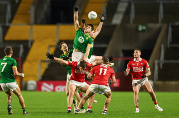 jack-kinlough-tries-to-punch-the-dropping-ball