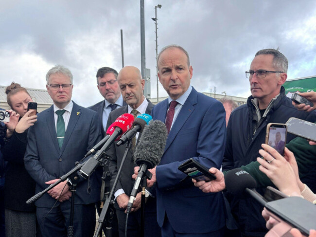 taoiseach-micheal-martin-speaks-to-media-outside-st-brigids-gaa-club-co-roscommon-as-he-rejects-claims-that-the-government-delayed-requesting-help-from-the-eu-following-widespread-damage-caused-by