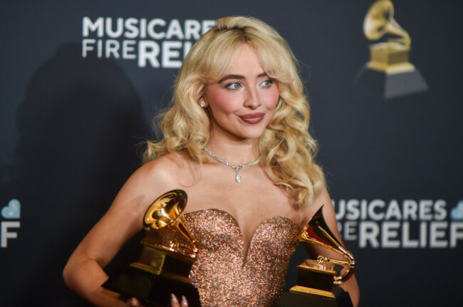 sabrina-carpenter-poses-in-the-press-room-with-the-award-for-best-pop-solo-performance-and-best-pop-vocal-album-during-the-67th-annual-grammy-awards-on-sunday-feb-2-2025-in-los-angeles-photo-by