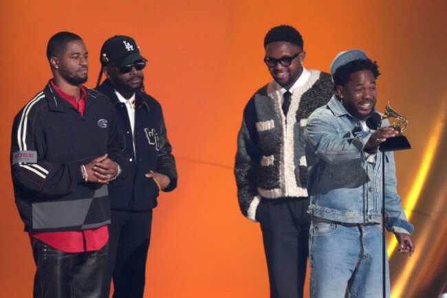 kendrick-lamar-center-accepts-the-award-for-song-of-the-year-for-not-like-us-during-the-67th-annual-grammy-awards-on-sunday-feb-2-2025-in-los-angeles-dave-free-from-left-sounwave-and-musta