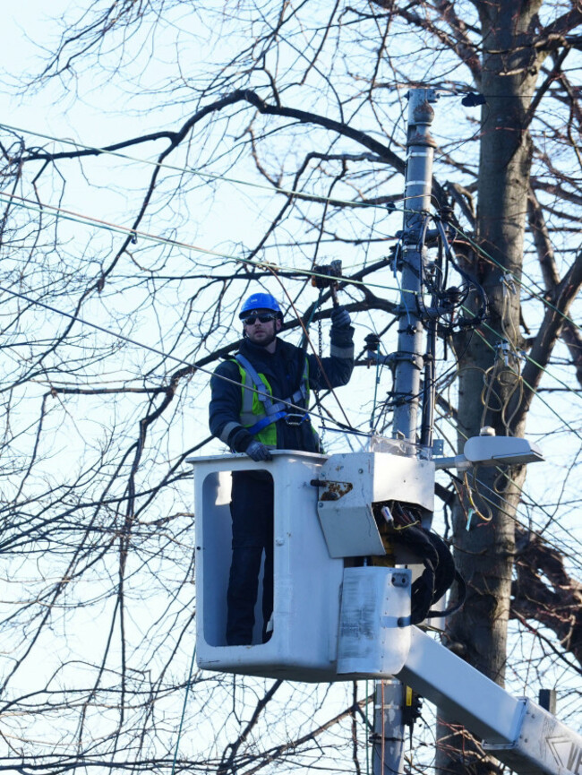 esb-networks-crew-working-to-restore-power-in-avoca-avenue-in-blackrock-co-dublin-after-storm-eowyn-left-one-person-dead-more-than-a-million-people-without-power-and-caused-significant-travel-disru