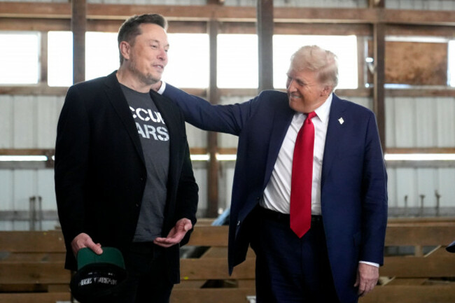 tesla-and-spacex-ceo-elon-musk-left-and-republican-presidential-nominee-former-president-donald-trump-attend-a-campaign-event-at-the-butler-farm-show-saturday-oct-5-2024-in-butler-pa-ap-phot
