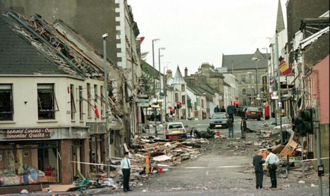 file-this-saturday-aug-15-1998-file-photo-shows-royal-ulster-constabulary-police-officers-as-they-stand-on-market-street-the-scene-of-a-car-bombing-in-the-centre-of-omagh-co-tyrone-72-miles-we