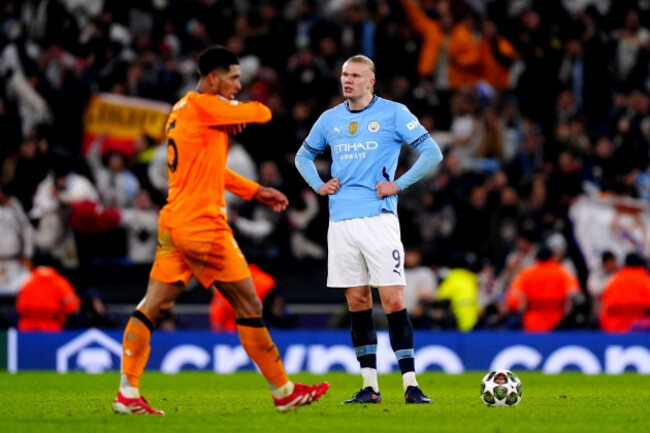 manchester-citys-erling-haaland-stands-dejected-after-conceding-a-third-goal-during-the-uefa-champions-league-knockout-phase-play-offs-first-leg-match-at-the-etihad-stadium-manchester-picture-date