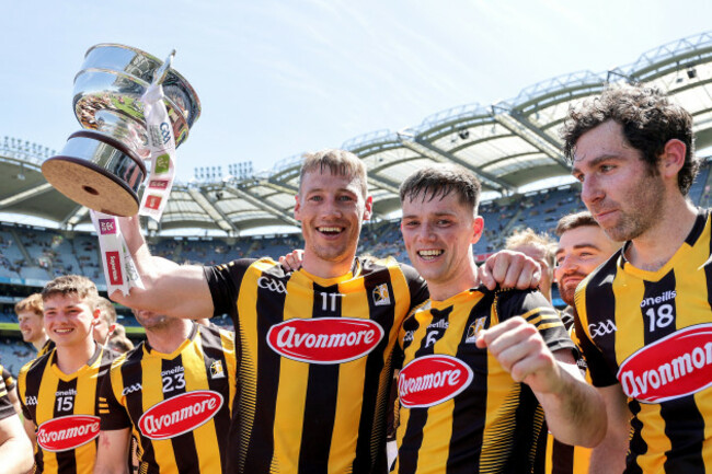 mick-malone-and-ciaran-wallace-celebrate-after-the-game-with-the-trophy
