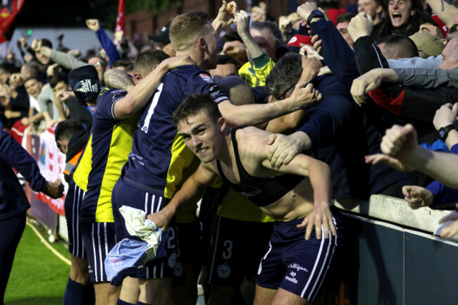 evan-caffrey-celebrates-scoring-a-goal-with-fans