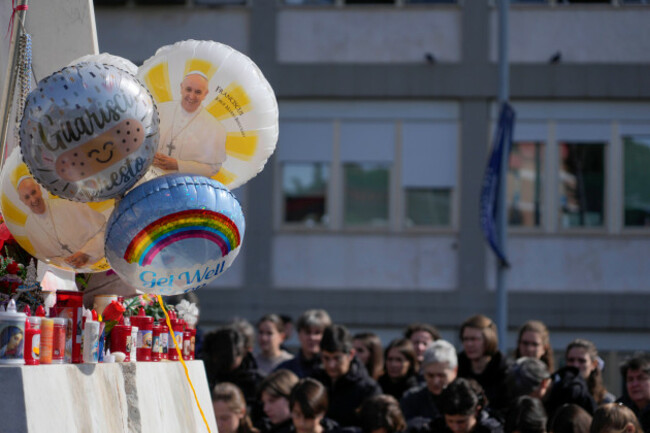 balloons-with-pictures-of-pope-francis-are-seen-outside-the-agostino-gemelli-polyclinic-in-rome-sunday-feb-23-2025-where-the-pontiff-is-hospitalized-since-feb-14-ap-photogregorio-borgia