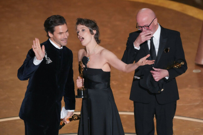 clement-ducol-from-left-camille-and-jacques-audiard-accept-the-award-for-best-original-song-for-el-mal-from-emilia-perez-during-the-oscars-on-sunday-march-2-2025-at-the-dolby-theatre-in-los