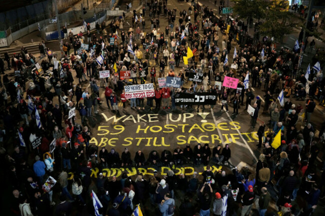 people-take-part-in-a-protest-demanding-the-immediate-release-of-hostages-held-by-hamas-in-the-gaza-strip-in-tel-aviv-israel-saturday-march-1-2025-ap-photoleo-correa