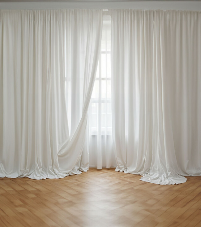 whitecurtainsinabrightroomwithawindow