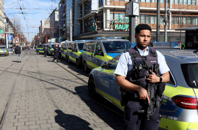a-police-officer-secures-a-street-in-the-city-center-of-mannheim-germany-monday-march-3-2025-following-an-incident-in-which-one-person-was-killed-and-others-injured-when-a-car-rammed-into-a-crowd