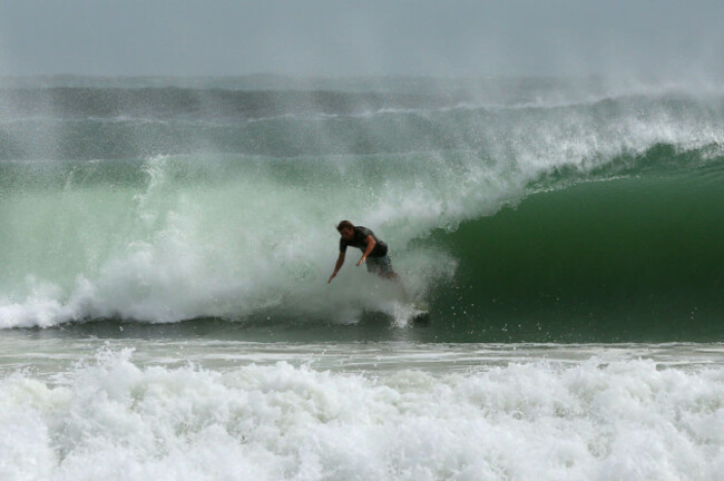 brisbane-australia-02nd-mar-2025-a-surfer-falls-off-their-board-at-mooloolaba-beach-while-a-large-and-increasing-swell-bears-down-on-south-east-queensland-around-point-cartwright-on-the-sunshine-c