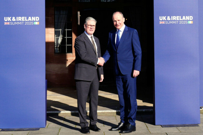 britains-prime-minister-keir-starmer-left-welcomes-irelands-counterpart-taoiseach-micheal-martin-to-the-uk-ireland-summit-2025-at-inglewood-manor-house-in-ellesmere-port-liverpool-britain-thurs
