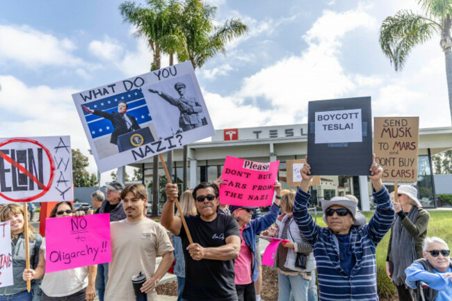 santa-barbara-protesters-gather-at-the-tesla-dealership-of-elon-musk-in-santa-barbara-ca-on-march-1-2025-with-calls-for-a-boycott-of-tesla-and-end-to-his-attempted-government-takeover-photo-by-rod