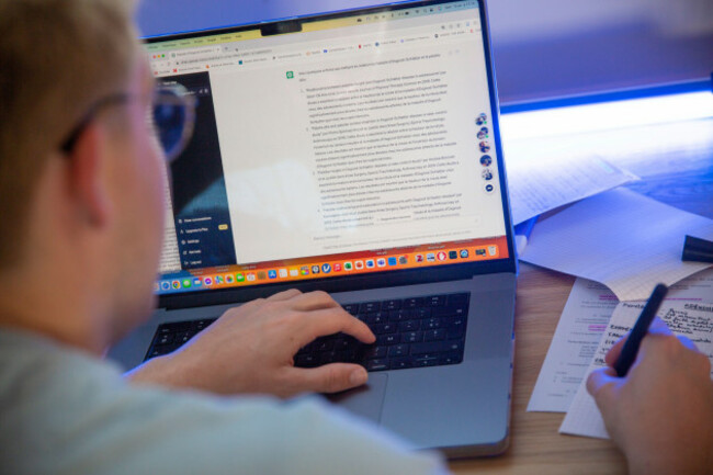 teen-using-chatgpt-advanced-ai-chatbot-interacting-in-a-conversational-way-to-do-this-homework