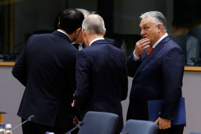 hungarys-prime-minister-viktor-orban-right-during-a-round-table-meeting-at-an-eu-summit-in-brussels-thursday-march-6-2025-ap-photogeert-vanden-wijngaert