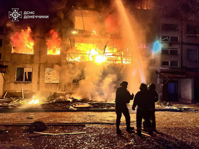 in-this-photo-provided-by-the-ukrainian-emergency-service-firefighters-put-out-the-fire-following-a-russian-rocket-attack-in-dobropillya-donetsk-region-ukraine-saturday-march-8-2025-ukrainian