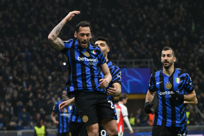 hakan-ealhanoglu-of-fc-inter-celebrating-after-a-goal-during-the-uefa-champions-league-round-of-16-second-leg-match-between-inter-fc-internazionale-and-feyenoord-rotterdam-on-10-of-march-2025-at-giu