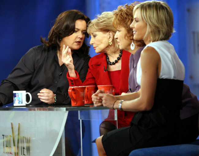rosie-odonnell-left-talks-to-co-hosts-barbara-walters-second-from-left-as-joy-behar-second-from-right-and-elisabeth-hasselbeck-listen-during-a-commercial-break-of-the-taping-of-the-first-show