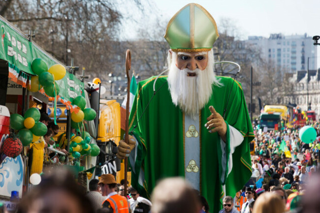 a-5m-tall-st-patrick-created-by-emergency-exit-arts-winds-its-way-down-the-parade-st-patricks-day-parade-in-central-london