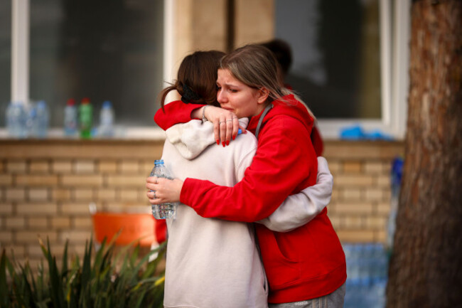 women-cry-and-hug-outside-a-hospital-in-the-town-of-kocani-north-macedonia-sunday-march-16-2025-following-a-massive-fire-in-the-nightclub-early-sunday-ap-photoarmin-durgut