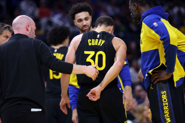 golden-state-warriors-stephen-curry-walks-off-the-court-after-injuring-himself-in-3rd-quarter-against-toronto-raptors-during-nba-game-at-chase-center-in-san-francisco-on-thursday-march-20-2025-sc