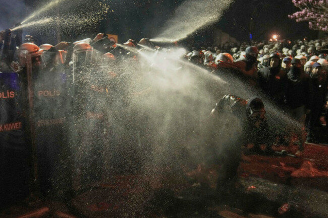 riot-police-use-pepper-spray-to-clear-a-protester-during-a-protest-against-the-arrest-of-istanbuls-mayor-ekrem-imamoglu-in-istanbul-turkey-saturday-march-22-2025-ap-photokhalil-hamra
