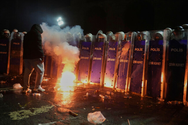 riot-police-stand-guard-during-a-protest-against-the-arrest-of-istanbuls-mayor-ekrem-imamoglu-in-istanbul-turkey-saturday-march-22-2025-ap-photofrancisco-seco