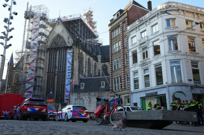police-officers-gather-in-a-cordoned-off-area-after-a-stabbing-near-dam-square-in-central-amsterdam-thursday-march-27-2025-ap-photopeter-dejong