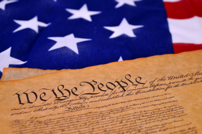 preamble-to-the-us-constitution-with-the-stars-and-stripes-in-the-background