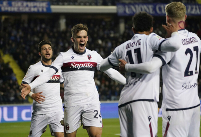 bolognas-thijs-dallinga-second-left-scores-their-sides-third-goal-of-the-game-during-the-italian-cup-semi-final-first-leg-soccer-match-between-empoli-and-bologna-at-the-renato-castellani-stadium