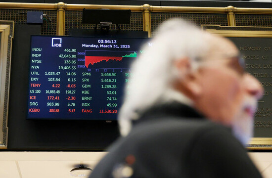 new-york-united-states-31st-mar-2025-traders-work-on-the-floor-of-the-new-york-stock-exchange-on-wall-street-on-monday-march-31-2025-in-new-york-city-us-stocks-rebounded-on-monday-to-end-a-vola