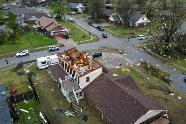 an-early-morning-severe-storm-damaged-homes-destroying-the-roofs-and-knocked-down-power-lines-trees-and-fences-off-96th-street-north-near-garnett-road-wednesday-april-2-2025-in-owasso-okla-m