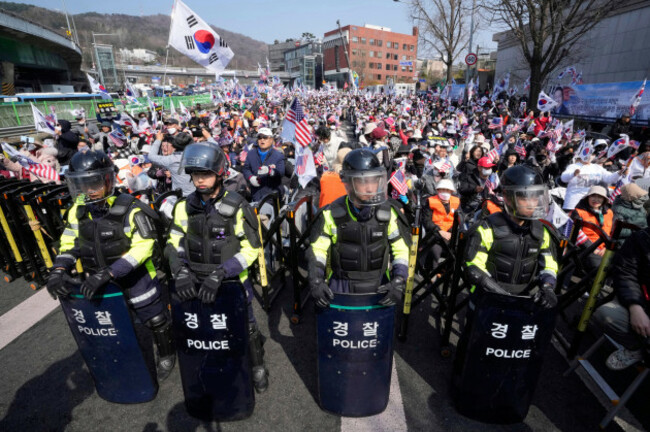 supporters-of-impeached-south-korean-president-yoon-suk-yeol-stage-a-rally-to-oppose-his-impeachment-near-the-presidential-residence-in-seoul-south-korea-friday-april-4-2025-ap-photoahn-young-j