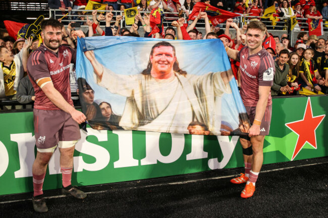 john-hodnett-and-jack-crowley-celebrate-after-the-game-with-a-stephen-archer-fan-flag