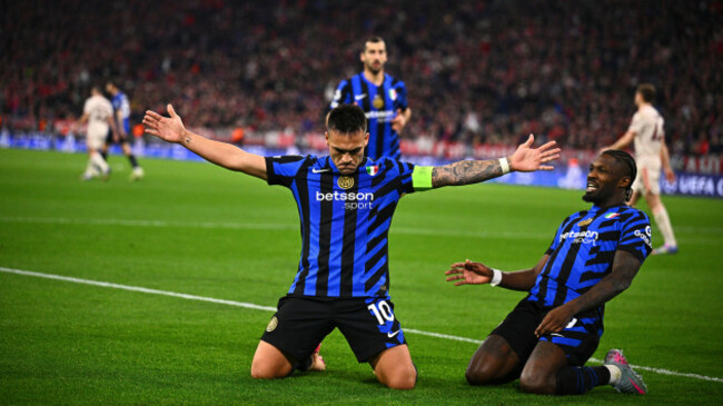 inter-milans-lautaro-martinez-left-celebrates-after-scoring-the-opening-goal-during-the-champions-league-quarterfinals-first-leg-soccer-match-between-fc-bayern-munich-and-inter-milan-at-the-allian