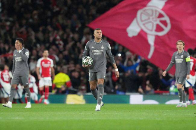 real-madrids-kylian-mbappe-center-reacts-after-arsenals-declan-rice-scored-his-sides-second-goal-during-the-champions-league-quarterfinal-first-leg-soccer-match-between-arsenal-and-real-madrid-at