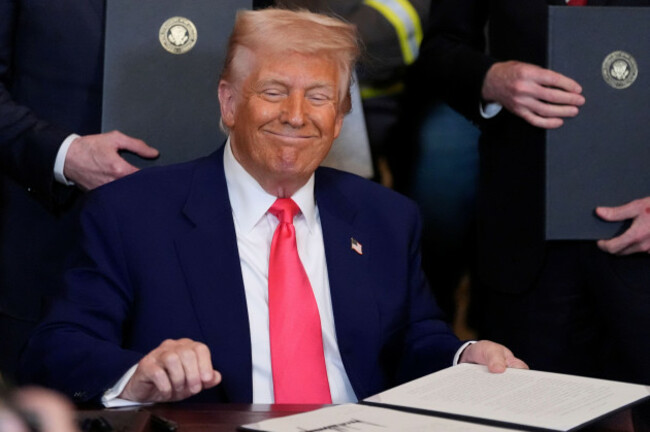 president-donald-trump-smiles-after-signing-an-executive-order-during-an-event-in-the-east-room-of-the-white-house-tuesday-april-8-2025-in-washington-ap-photoalex-brandon