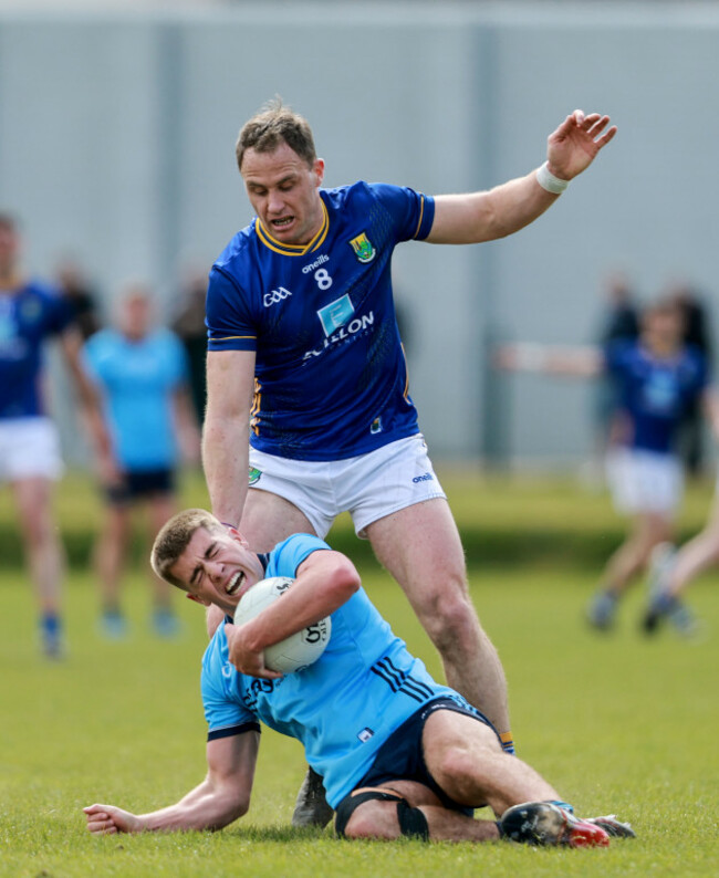 greg-mceneaney-is-tackled-by-dean-healy