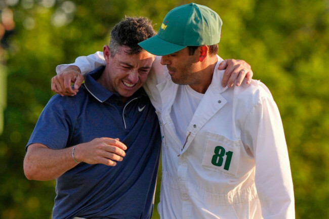rory-mcilroy-of-northern-ireland-hugs-caddie-harry-diamond-right-after-winning-in-a-playoff-against-justin-rose-of-england-after-the-final-round-the-masters-golf-tournament-sunday-april-13-20