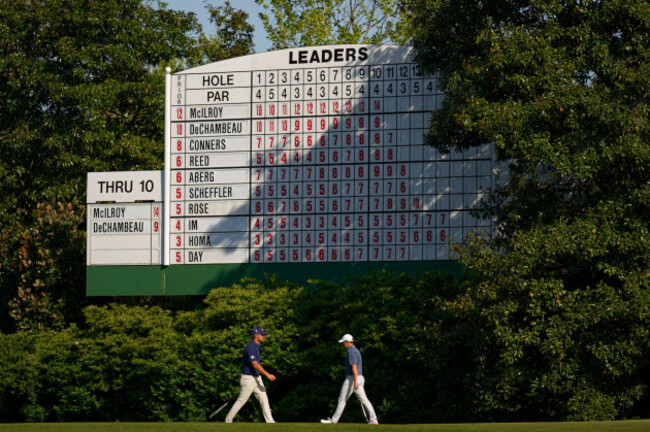 bryson-dechambeau-left-and-walk-rory-mcilroy-of-northern-ireland-walk-on-the-11th-hole-during-the-final-round-at-the-masters-golf-tournament-sunday-april-13-2025-in-augusta-ga-ap-photogeor