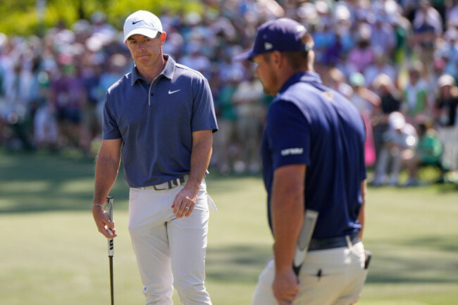 rory-mcilroy-of-northern-ireland-watches-bryson-dechambeau-on-the-sixth-hole-during-the-final-round-at-the-masters-golf-tournament-sunday-april-13-2025-in-augusta-ga-ap-photojulia-demaree-ni