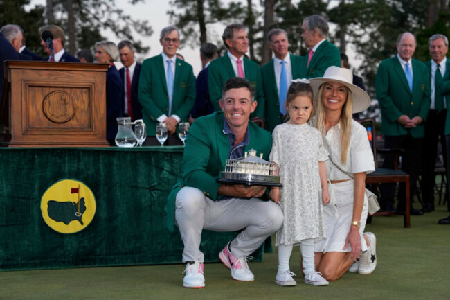 rory-mcilroy-of-northern-ireland-with-his-wife-erica-stoll-and-daughter-poppy-holds-the-trophy-after-winning-the-masters-golf-tournament-sunday-april-13-2025-in-augusta-ga-ap-photodavid-j